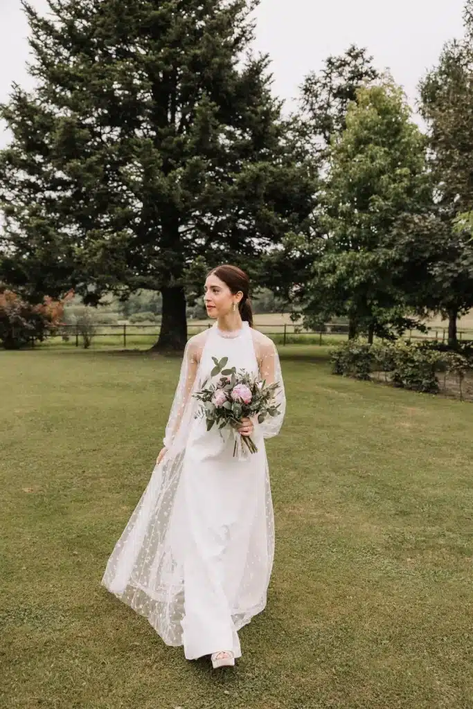 Bride portrait outside countryside house during wedding in France