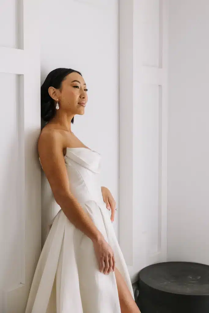 Modern bride portrait in minimalist gown at wedding in Greece