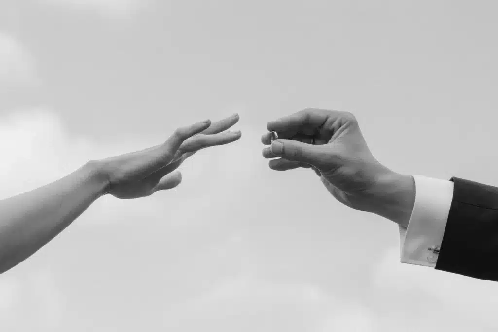 Minimalist black and white hand detail at wedding in Greece