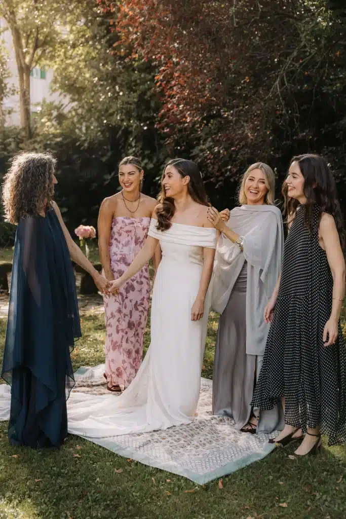 Bridesmaids walking together at elegant wedding in England