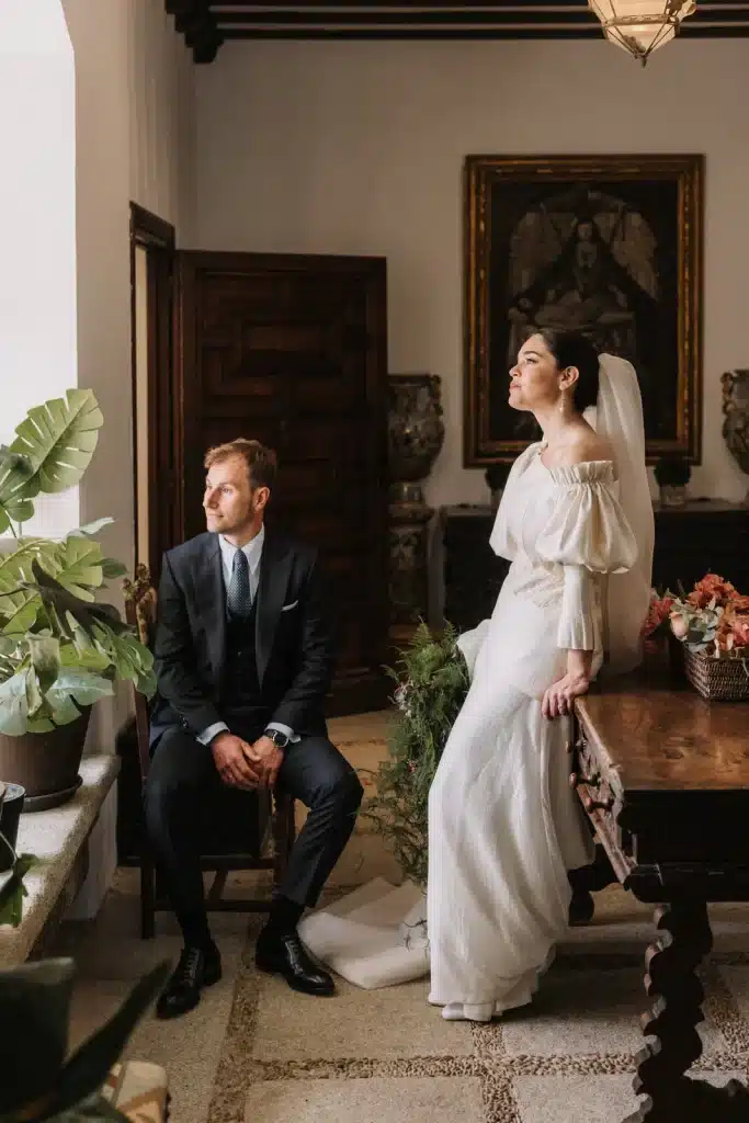Bride and groom portrait inside classic villa in Spain