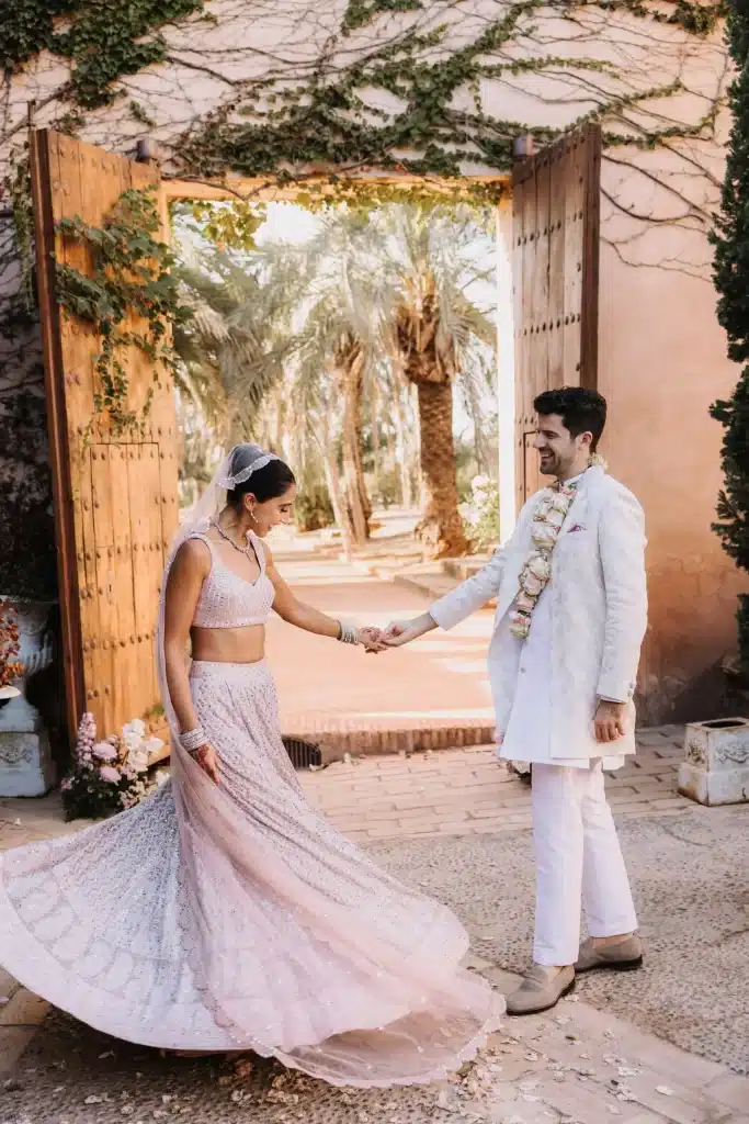 Bride and groom at floral ceremony setup in Tuscany