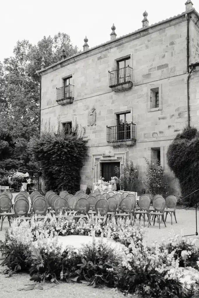 Historic stone wedding venue in the Paris, France with outdoor ceremony setup