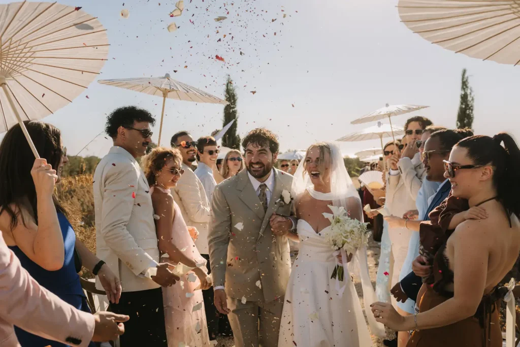 Wedding couple leaving their ceremony at Villa Càrcara near Ragusa